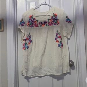 White blouse with colorful flowers